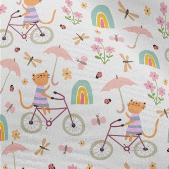 Kitten Riding A Bicycle In The Chiffon
