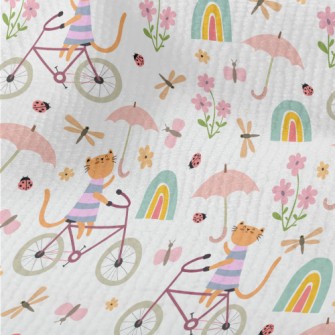 Kitten Riding A Bicycle In The Terry
