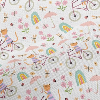 Kitten Riding A Bicycle In The Performance Linen
