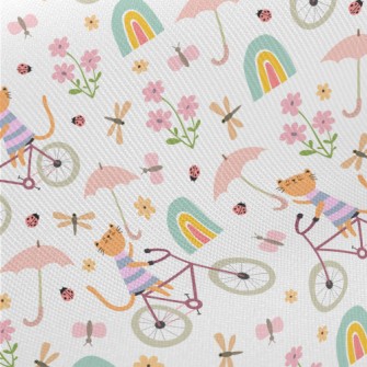 Kitten Riding A Bicycle In The Twill