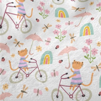 Kitten Riding A Bicycle In The Minky