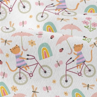 Kitten Riding A Bicycle In The Modern Jersey