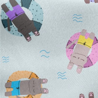 Cat Relaxing On Swimming Ring Jersey Backed Fleece