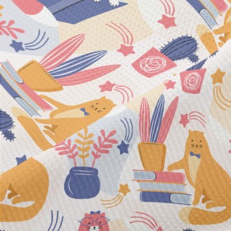 Spectacled Cat Admiring Flower Piqué