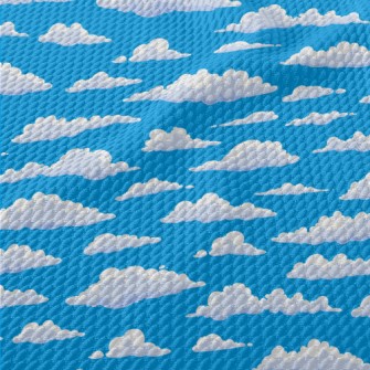 Fluffy Cartoon Clouds Birdseye Piqué