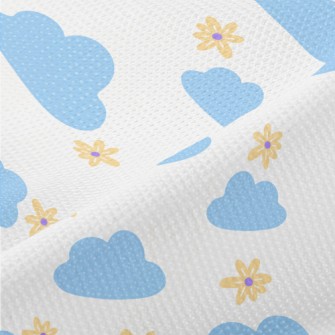 Small Flowers And Blue Clouds Piqué