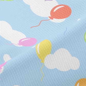 Colorful Balloons Flying Into  Piqué