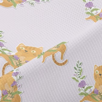 Cute Kitten Weaving A Wreath Piqué