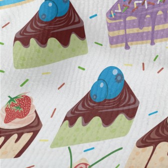 Various Sliced Cakes With Powd Terry