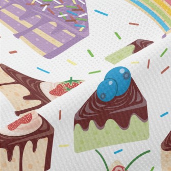 Various Sliced Cakes With Powd Piqué