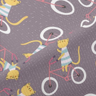 Kitten Riding A Bicycle Piqué